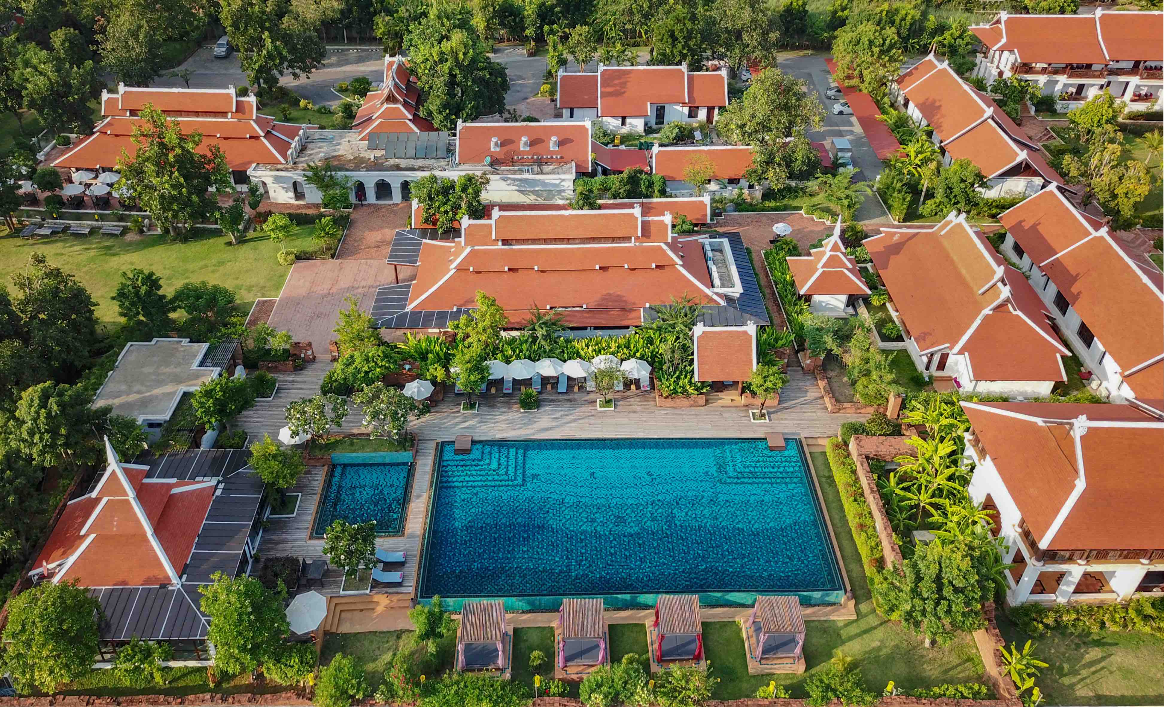 Sriwilai Sukhothai Resort & Spa — aerial view of the grounds between the historical park and the rice fields